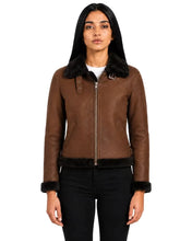 Women's black leather shearling leather jacket, side view