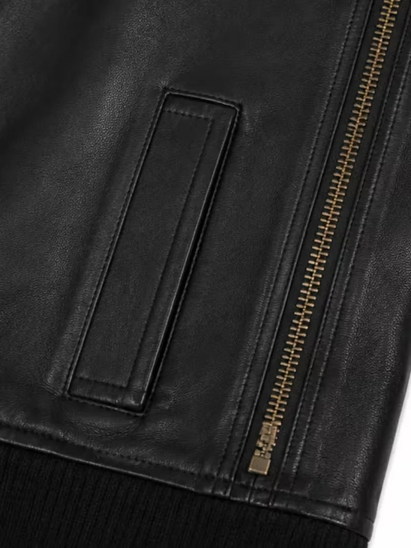 Women's black cowhide leather bomber jacket, zip and closure detail
