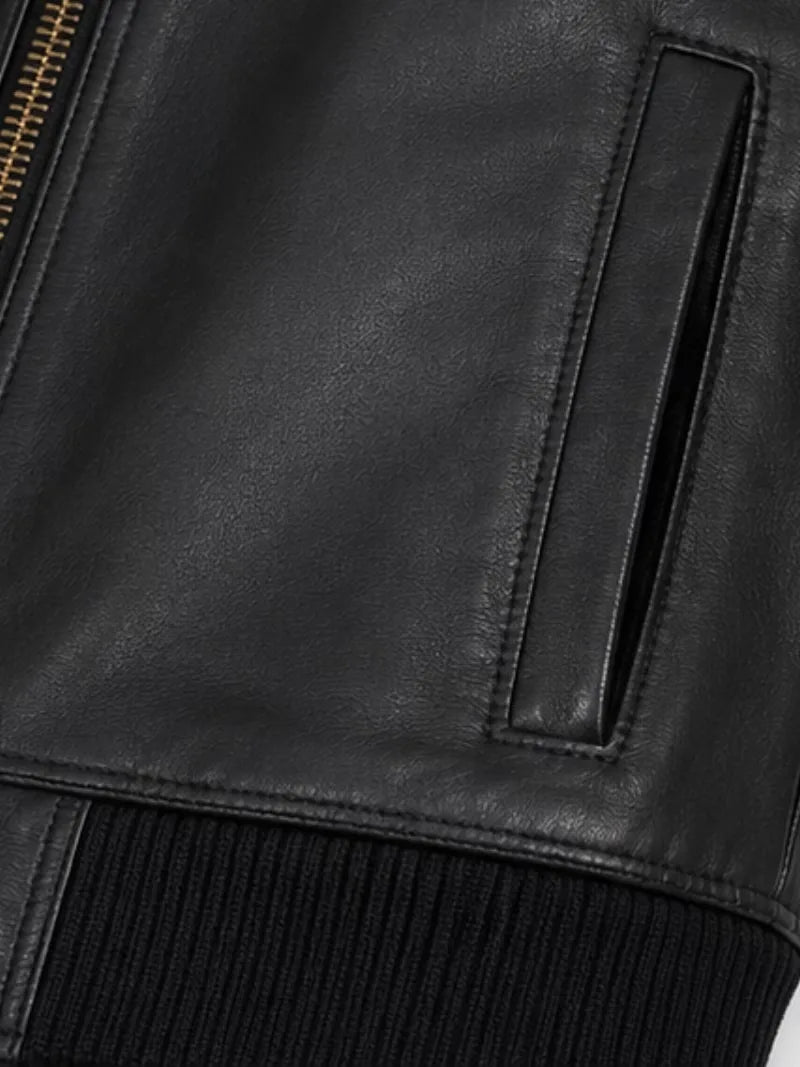 Women's black cowhide leather hooded jacket, zip and closure detail