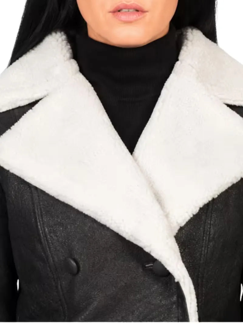 Women's black leather shearling leather jacket, zip and closure detail