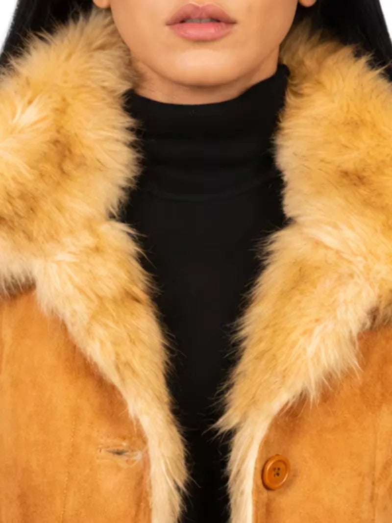 Women's black leather shearling leather jacket, zip and closure detail